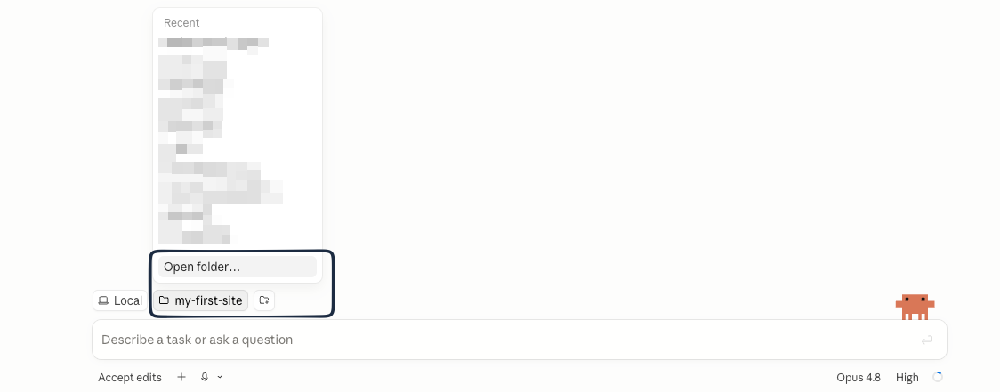 A fresh Claude Code session with an empty window and the folder-picker control highlighted — the button you click to choose the project folder Claude will work in.